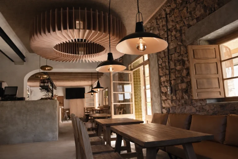 Restaurant with circular wooden ceiling lamps